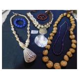 GROUP OF BEADED AND SHELL NECKLACES AND