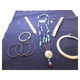 BEADED NECKLACE ON CORD WITH TURQUOISE CHIPS AND