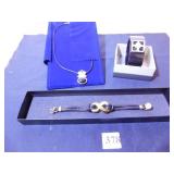 RHINESTONE AND BLACK VINYL BRACELET, BLACK STONE