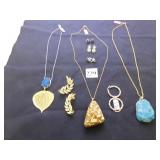 THREE PENDANT NECKLACES ONE LARGE GOLD CHUNK, ONE