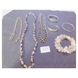 FOUR BRACELETS, TWO NECKLACES, WATCH CHAIN