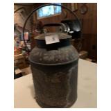 13" H CAN W/ EAGLE ON FRONT SOME RUST