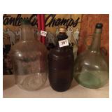 3 LARGE GLASS BOTTLES, BROWN IS A BARREL SHAPE