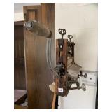 WRINGER FROM VINTAGE WASHER MOUNTED TO WALL