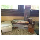 KNIVES, NEW CARVING KIVE AND PINEAPPLE SLICER