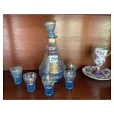 BLUE AND GOLD DECANTER AND 4 GLASSES