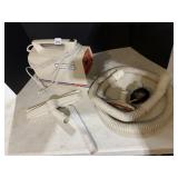 TRAVEL VAC W/ ATTACHMENTS