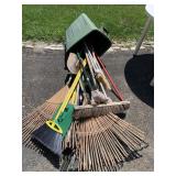 RAKES, SHOVELS, ETC. IN GARBAGE CAN