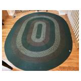 THREE COLOR OVAL WOVEN RUG 9