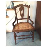 WALNUT CANED SEAT CHAIR W/ HIP RAILS 20" W CARVED