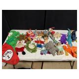 ASSORTMENT OF DOG TOYS AND A CHRISTMAS OUTFIT