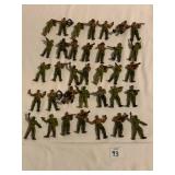 GROUP OF PLASTIC ARMY FIGURES MARKED M.I. 1986