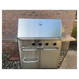 DACO GAS GRILL W/ BOOK CLEAN
