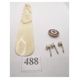 CARVED BONE ORIENTAL RAISED DESIGN FIGURES