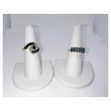 14K RING SIZE 7.5 WITH 7 BLUE STONES AND 14K RING