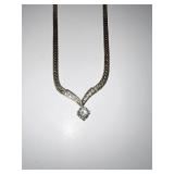 14K GOLD NECKLACE 17" LONG WITH ROUND CENTER.50