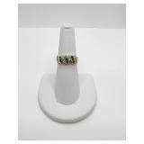 18K RING -MARKED 750 DIAMOND AND EMERALDS MISSING