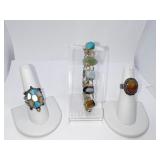 TWO SOUTHWEST DESIGN RINGS WITH TURQUOISE STONES,
