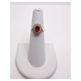 10K - CLEAR STONE SURROUND RED CENTER STONE 5.5