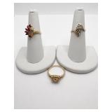 14K RINGS -RED STONE W/ 2 ROWS OF DIAMONDS SZ.