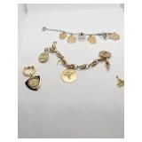 14K GOLD CHARM BRACELET W/ 14K CHARMS 12.93 DWT;