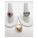 TWO STERLING RINGS ONE WITH BLUE STONES ONE WITH