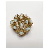 GOLD 1-1/2" X 1-1/2"BROOCH WITH 7 DIAMOND STONES