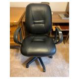 BLACK OFFICE CHAIR WITH ARMS AND ADJUSTMENTS