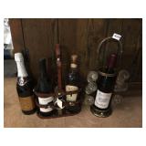 4 BOTTLES OF WINE, 2 WINE HOLDERS, ONE WITH SHOT