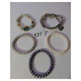 THREE PEARL BRACELETS WHITE GRAY AND SILVER