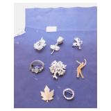 GROUP OF EIGHT SILVER TONE PINS BROOCHES