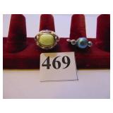 TWO STERLING SILVER RINGS SIZE 10 ONE WITH GREEN