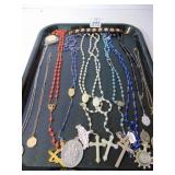GROUP OF ROSARY BEADS AND RELIGIOUS PENDANTS