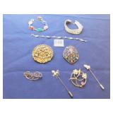 THREE BRACELETS, TWO SHOE CLIPS, FOUR PINS TWO