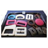 GROUP OF LEATHER COVERED BELT BUCKLE PARTS, THREE