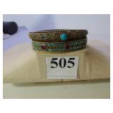 TWO HEIDI DAUS HINGED BRACELETS BLUE AND PURPLE