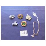 GROUP OF FIVE PINS AND ONE STERLING SILVER