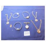 THREE MEDALLION GOLD TONE BRACELETS, THREE