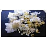 GROUP OF WHITE AND IVORY COLOR BUTTONS