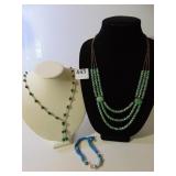 TRIPLE STRAND BEADED NECKLACE WITH 2 INLAID