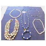 TRIPLE STRAND BEADED NECKLACE WITH TAG DUCHESS