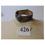 SILVER HINGED BANGLE BRACELET WITH CAMEL AND HAND