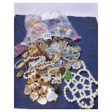 BAG OF BROKEN AND MISMATCHED COSTUME JEWELRY