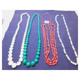 TRIPLE STRAND RED BEADED NECKLACE, TWO WHITE