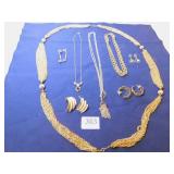 GOLD TONE NECKLACES ONE WITH RED STONE PENDANT,