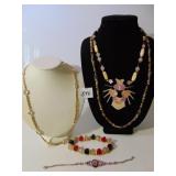 BEADED NECKLACE WITH LARGE LION HEAD INLAID