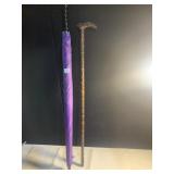 CARVED HEAD CANE AND LARGE UMBRELLA