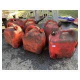 6 GAS CANS 5 GALLONS, 2 HAVE SPOUTS