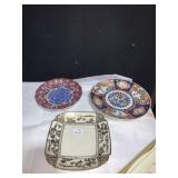 THREE ORIENTAL PLATES