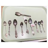 ASSORTED SILVERPLATE SPOONS .